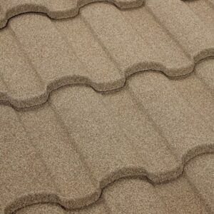 Close-up of Naples stone-coated steel roof tile in a warm sand beige tone